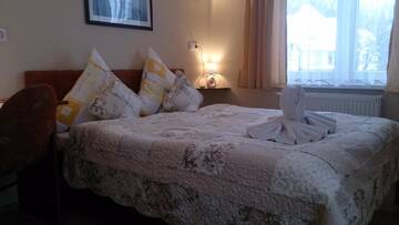 Фото номера Трехместный номер Проживание в семье Villa SORENTO г. Мельно 3