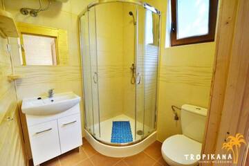 Фото номера Апартаменты с 2 спальнями Лоджи Tropikana Domki, Apartamenty г. Мельно 18