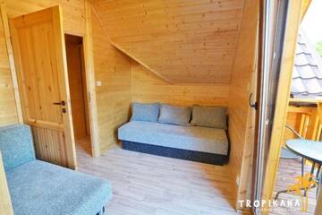 Фото номера Апартаменты с 2 спальнями Лоджи Tropikana Domki, Apartamenty г. Мельно 16