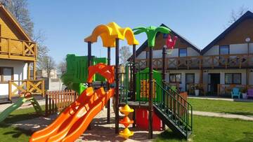 Фото номера Апартаменты с 2 спальнями Лоджи Tropikana Domki, Apartamenty г. Мельно 19