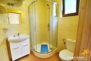 Фото номера Апартаменты с 2 спальнями Лоджи Tropikana Domki, Apartamenty г. Мельно 10