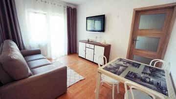 Фото номера Апартаменты с 2 спальнями Апартаменты Apartamenty na pięterku г. Мельно 7