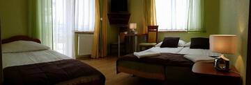 Фото номера Трехместный номер с балконом Проживание в семье Villa Dora г. Мельно 4