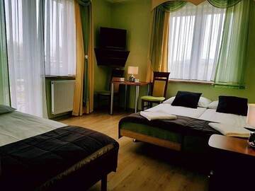 Фото номера Трехместный номер с балконом Проживание в семье Villa Dora г. Мельно 6