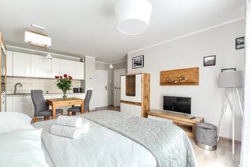 Фото номера Номер-студио с видом на озеро Апартаменты Mielno Apartments Rezydencja Park г. Мельно 5