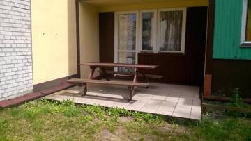 Фото номера Двухместный номер с 1 кроватью и общей ванной комнатой Лоджи Pokoje w domkach г. Мельно 7