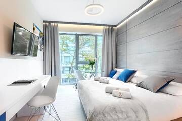 Фото номера Номер-студио Делюкс, боковой вид на море Апарт-отели Dune Resort Mielno - B г. Мельно 6