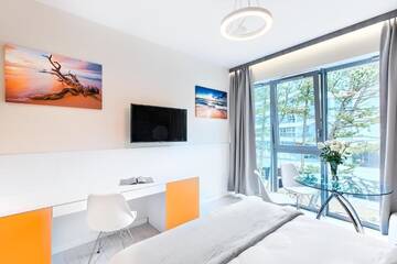 Фото номера Номер-студио Делюкс, боковой вид на море Апарт-отели Dune Resort Mielno - B г. Мельно 10